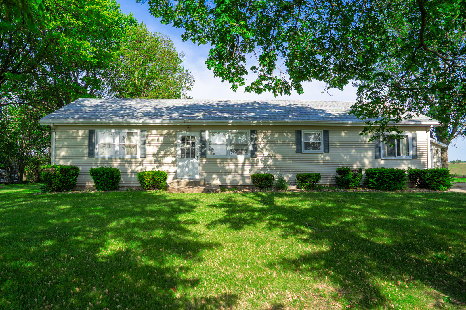 2056 Peek Home Road Dixon, IL 61021 - Photo 28 of 47 a view of a house with a garden