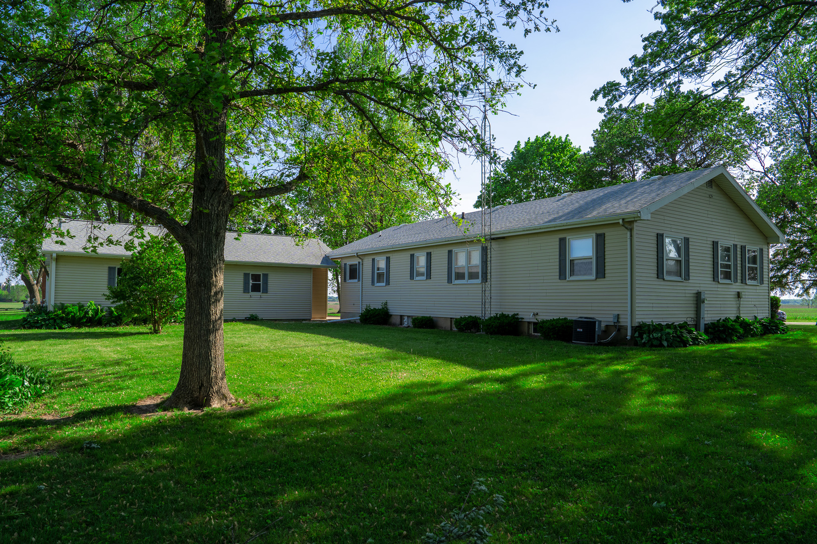 2056 Peek Home Road Dixon, IL 61021 - Photo 34 of 47 a view of a house with a backyard
