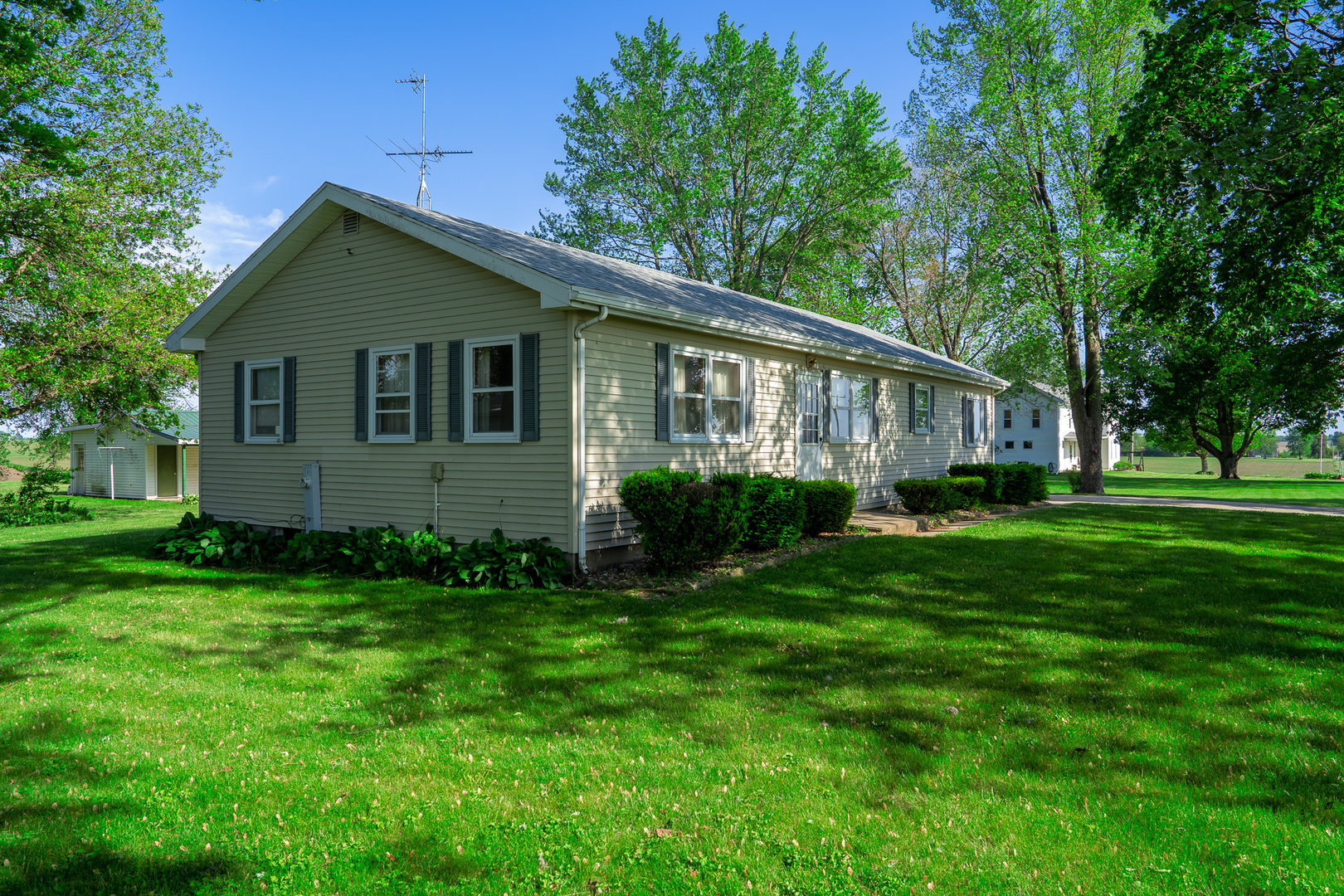 2056 Peek Home Road Dixon, IL 61021 - Photo 37 of 47 a house view with a garden space