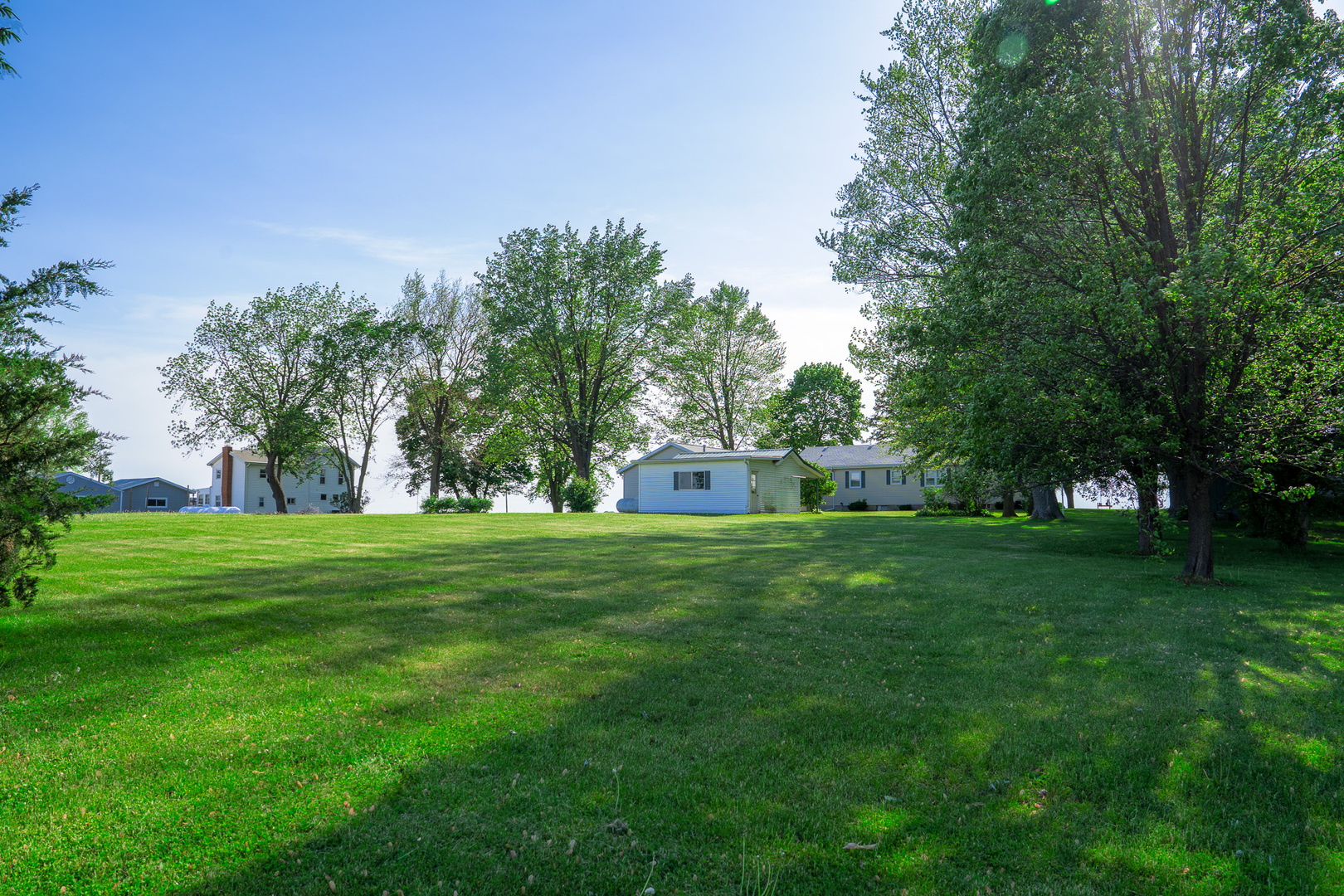 2056 Peek Home Road Dixon, IL 61021 - Photo 41 of 47 a front view of a house with a yard