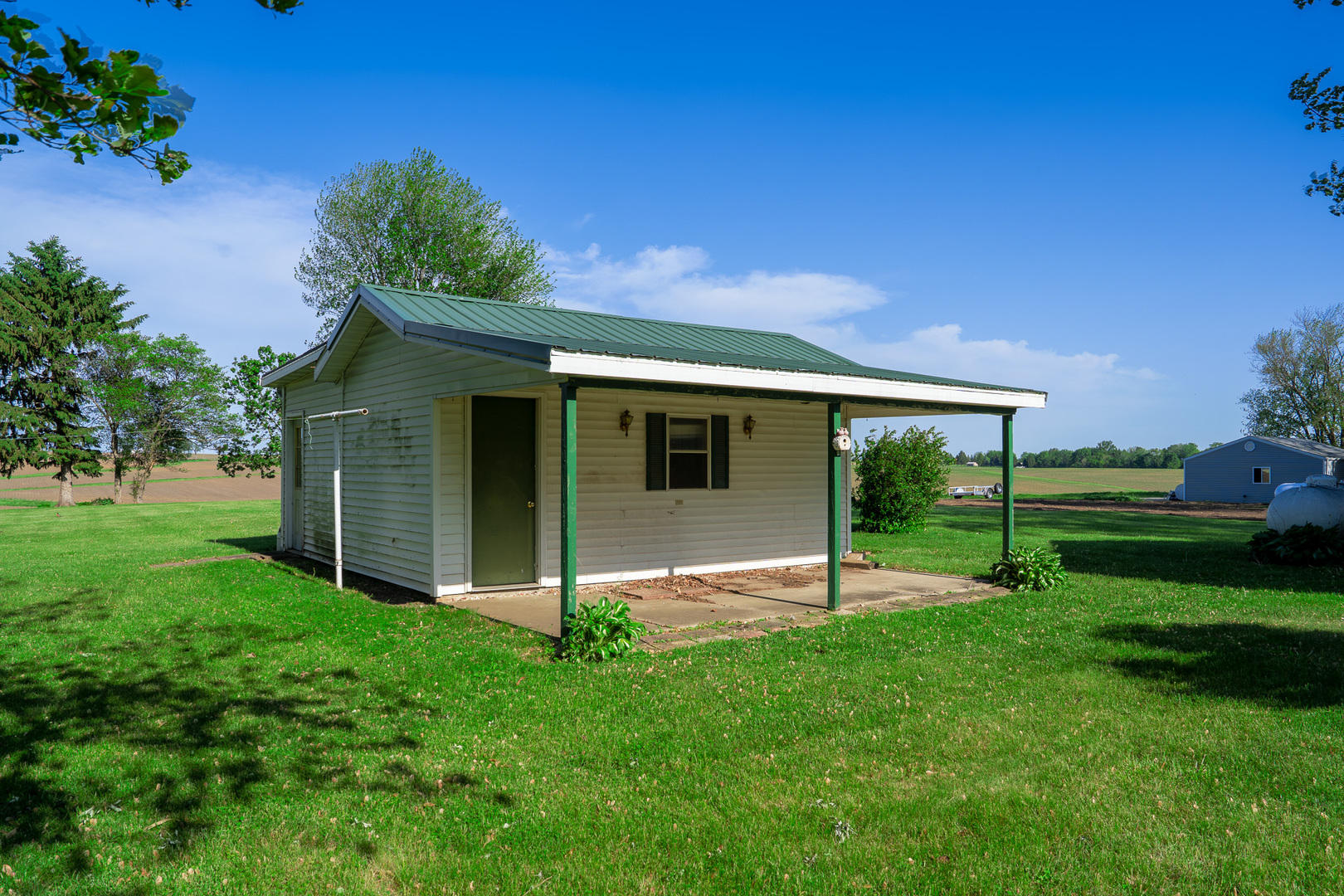 2056 Peek Home Road Dixon, IL 61021 - Photo 43 of 47 a view of an house with backyard space and garden