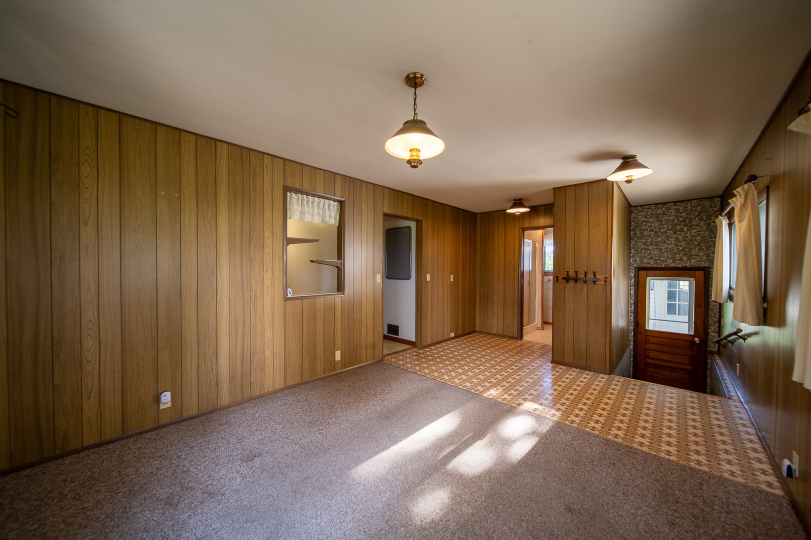 2056 Peek Home Road Dixon, IL 61021 - Photo 6 of 47 a view of a hallway with wooden shelves