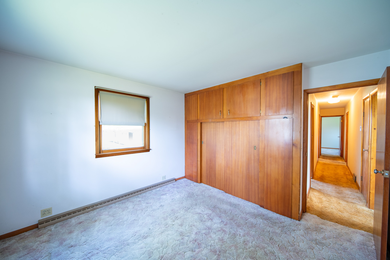 2056 Peek Home Road Dixon, IL 61021 - Photo 10 of 47 an empty room with windows and closet