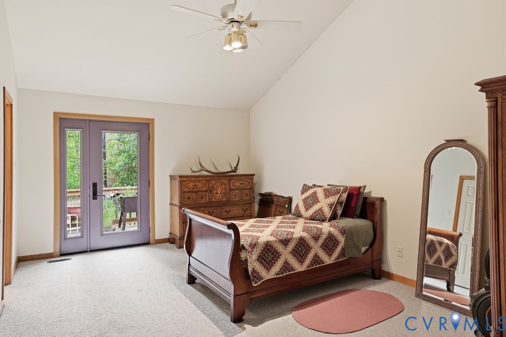 1061 Turkey Ridge Drive Moseley, VA 23120 - Photo 18 of 51 a bedroom with a bed and a window