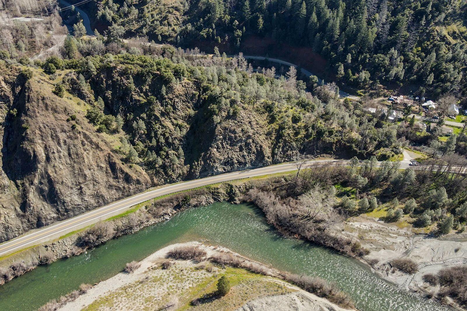 71 Gilzean Road Junction City, CA 96048 - Photo 9 of 14 a view of a lake with a yard