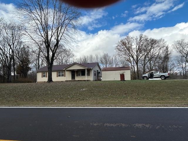 7030 Asbury Glimp Road Ripley, TN 38063 - Photo 2 of 22 Single story home with a front yard