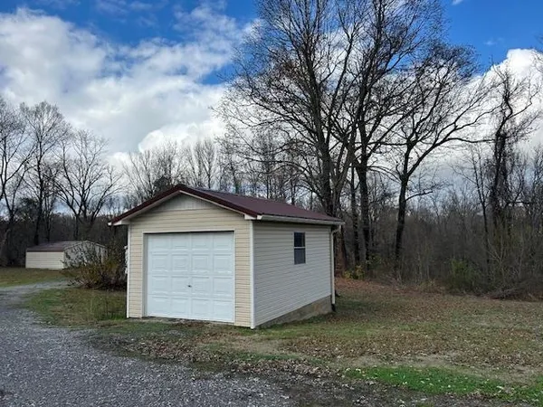 a house with trees in front of it