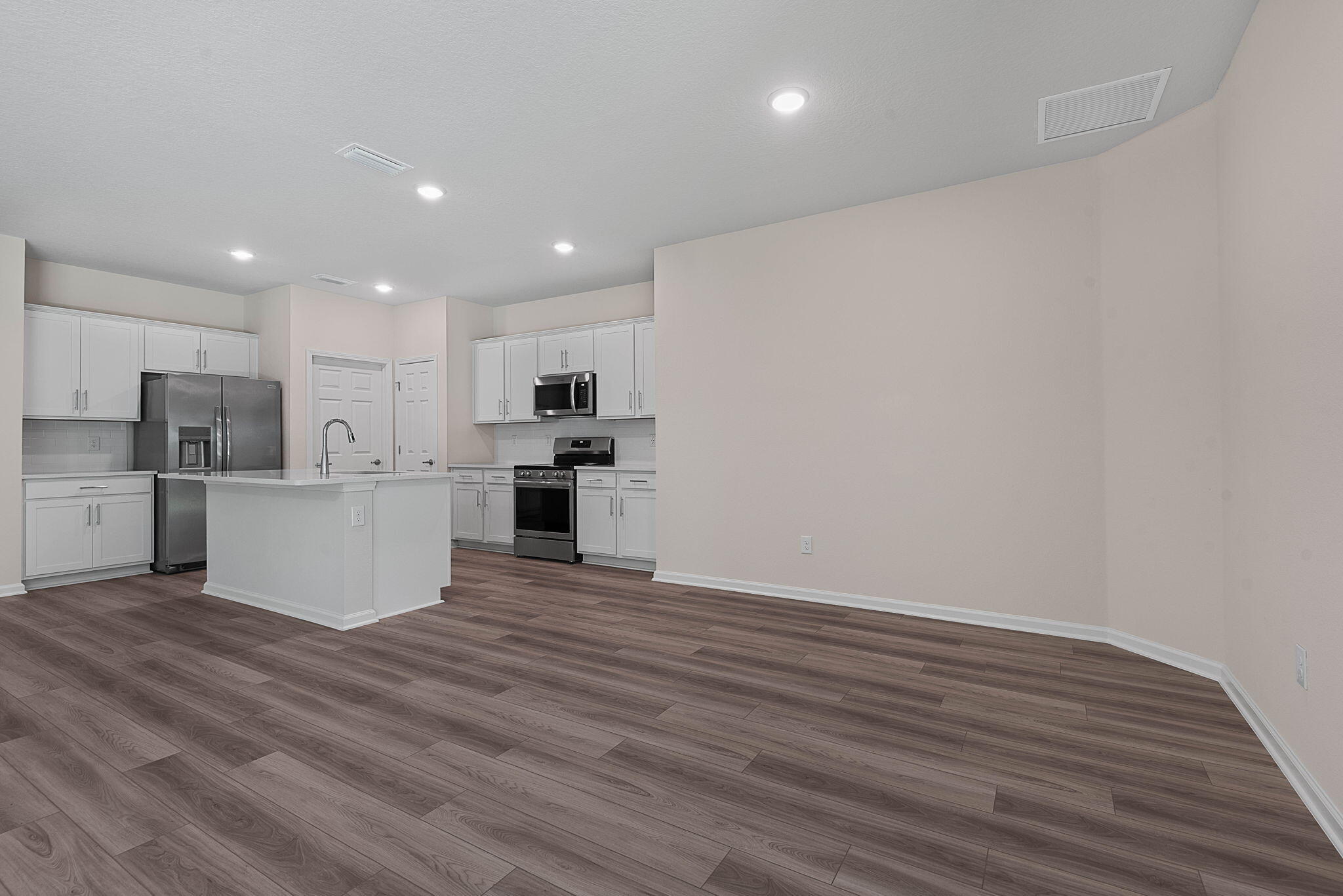 46 Poplar Drive Palm Coast, FL 32164 - Photo 26 of 59 a view of kitchen with wooden floor