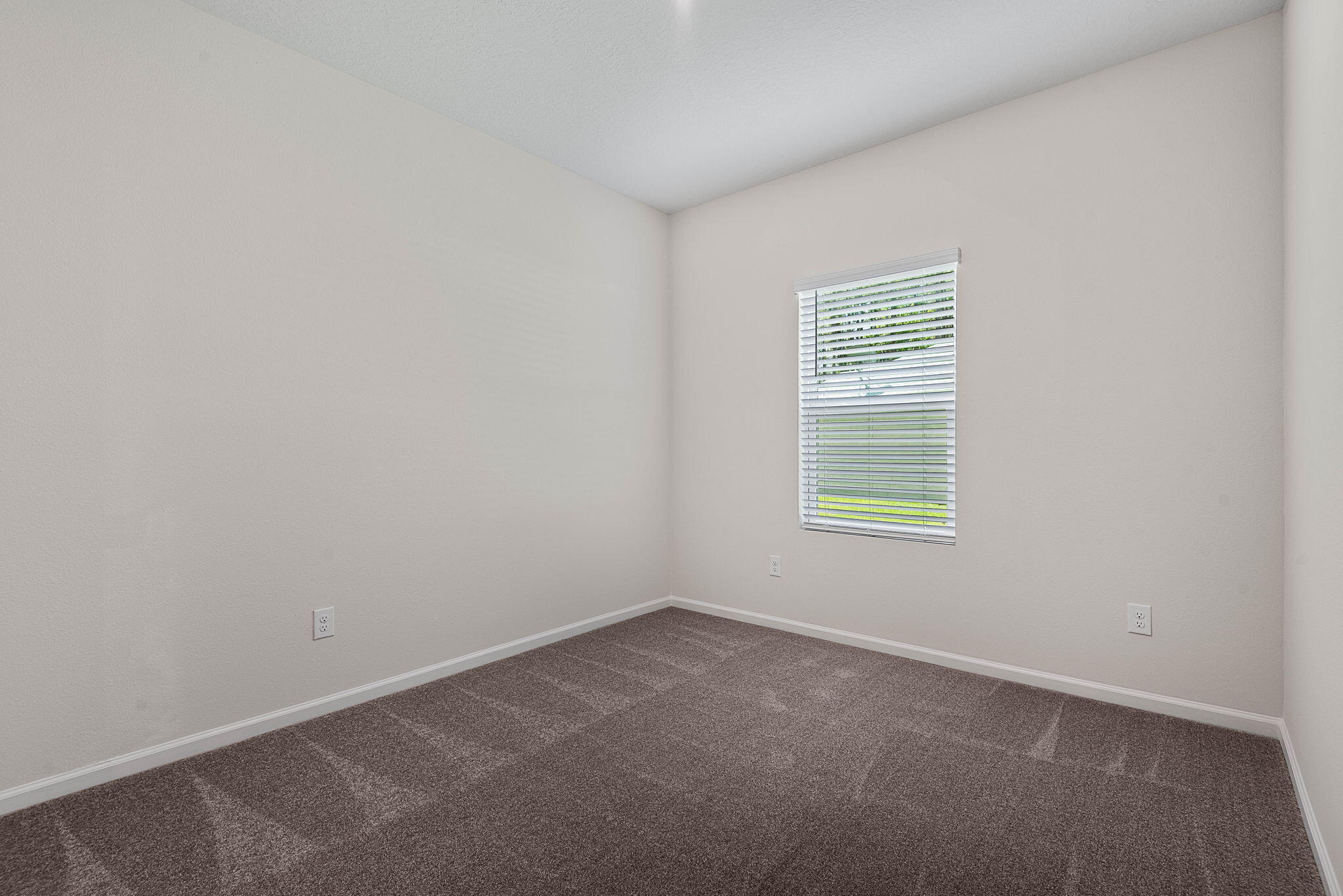 46 Poplar Drive Palm Coast, FL 32164 - Photo 40 of 59 an empty room with a window