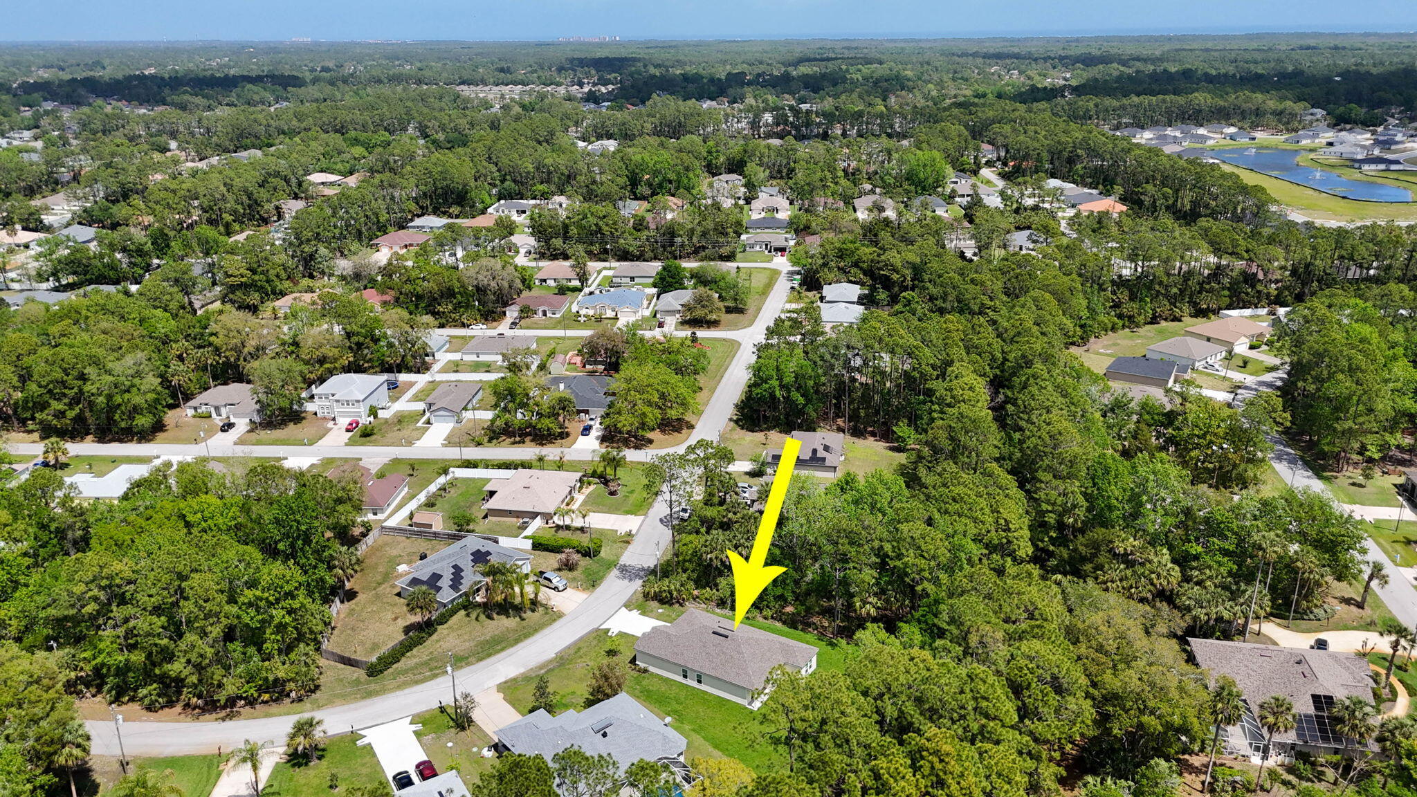 46 Poplar Drive Palm Coast, FL 32164 - Photo 51 of 59 an aerial view of residential houses with outdoor space and trees