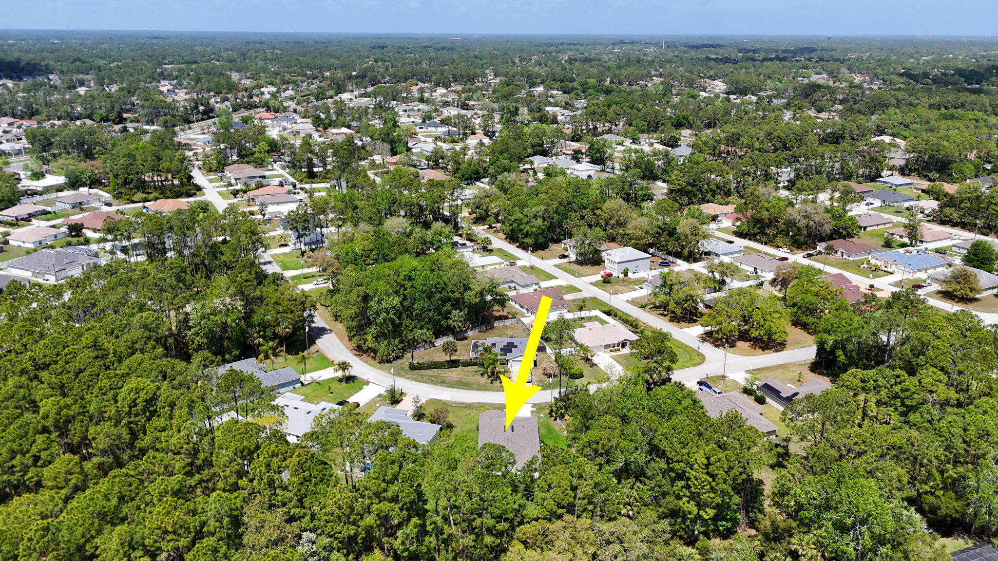 46 Poplar Drive Palm Coast, FL 32164 - Photo 52 of 59 an aerial view of residential houses with outdoor space and trees