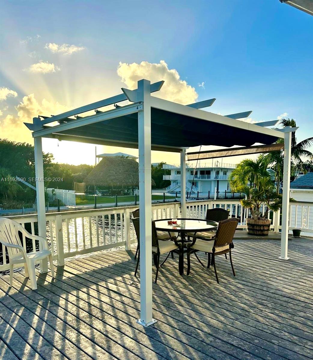 72 Ocean Drive Key Largo, FL 33037 - Photo 4 of 36 a patio view with a seating space