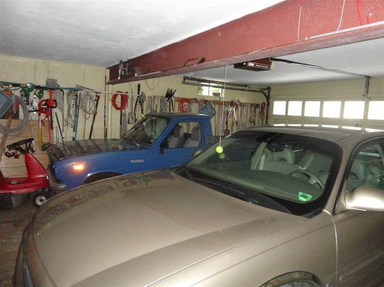 131 Old Kings Road Cotuit, MA 02635 - Photo 21 of 33 a view of car garage