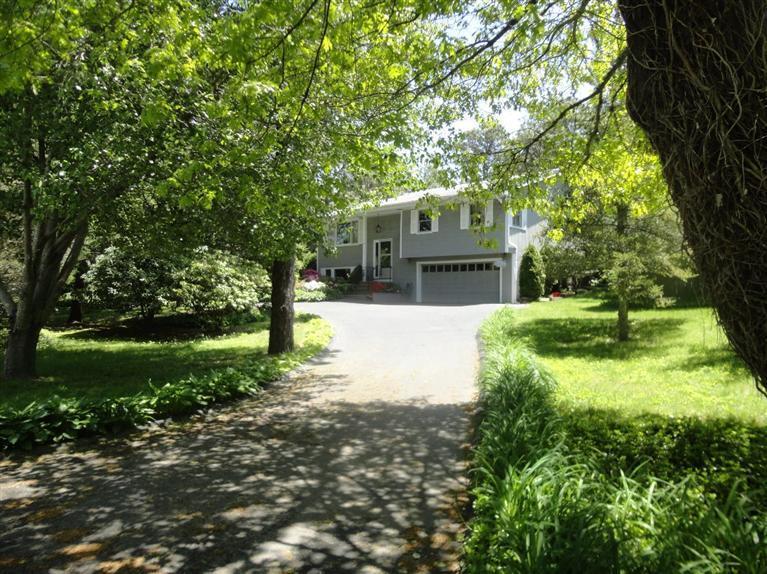 131 Old Kings Road Cotuit, MA 02635 - Photo 4 of 33 a view of a house with a yard
