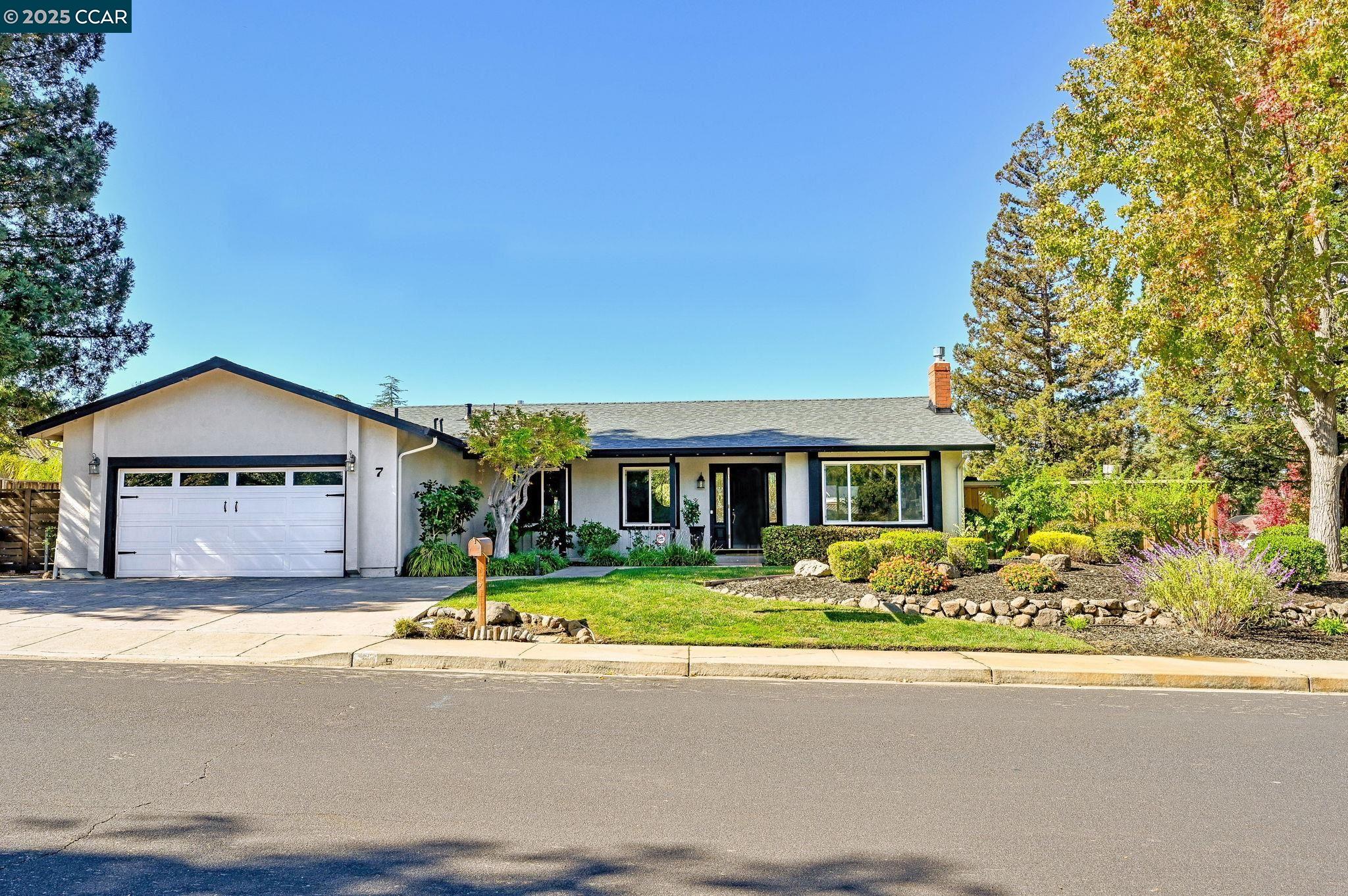 front view of house with a yard