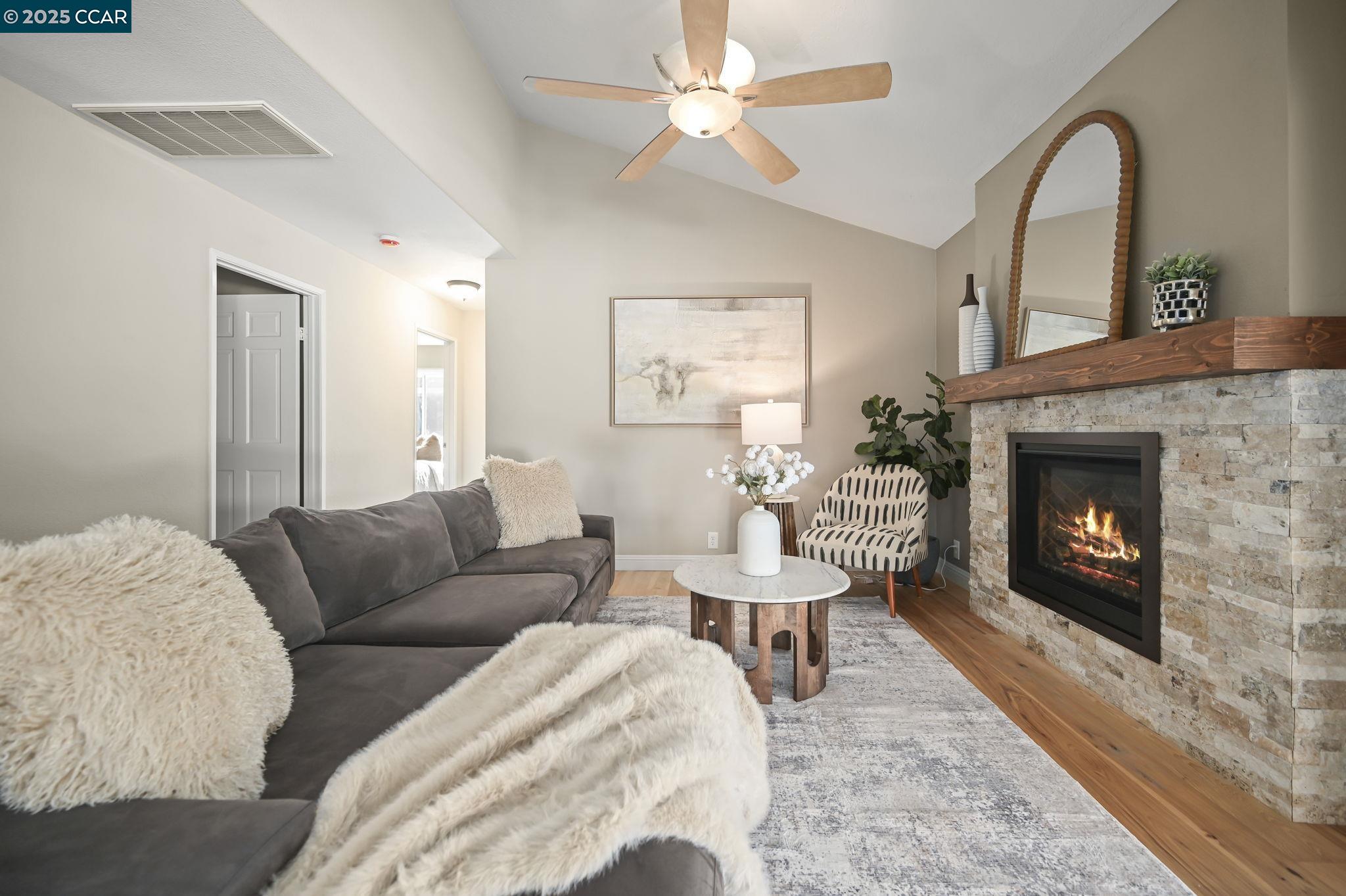7 Atchinson Stage Road Clayton, CA 94517 - Photo 14 of 37 a living room with furniture and a fireplace