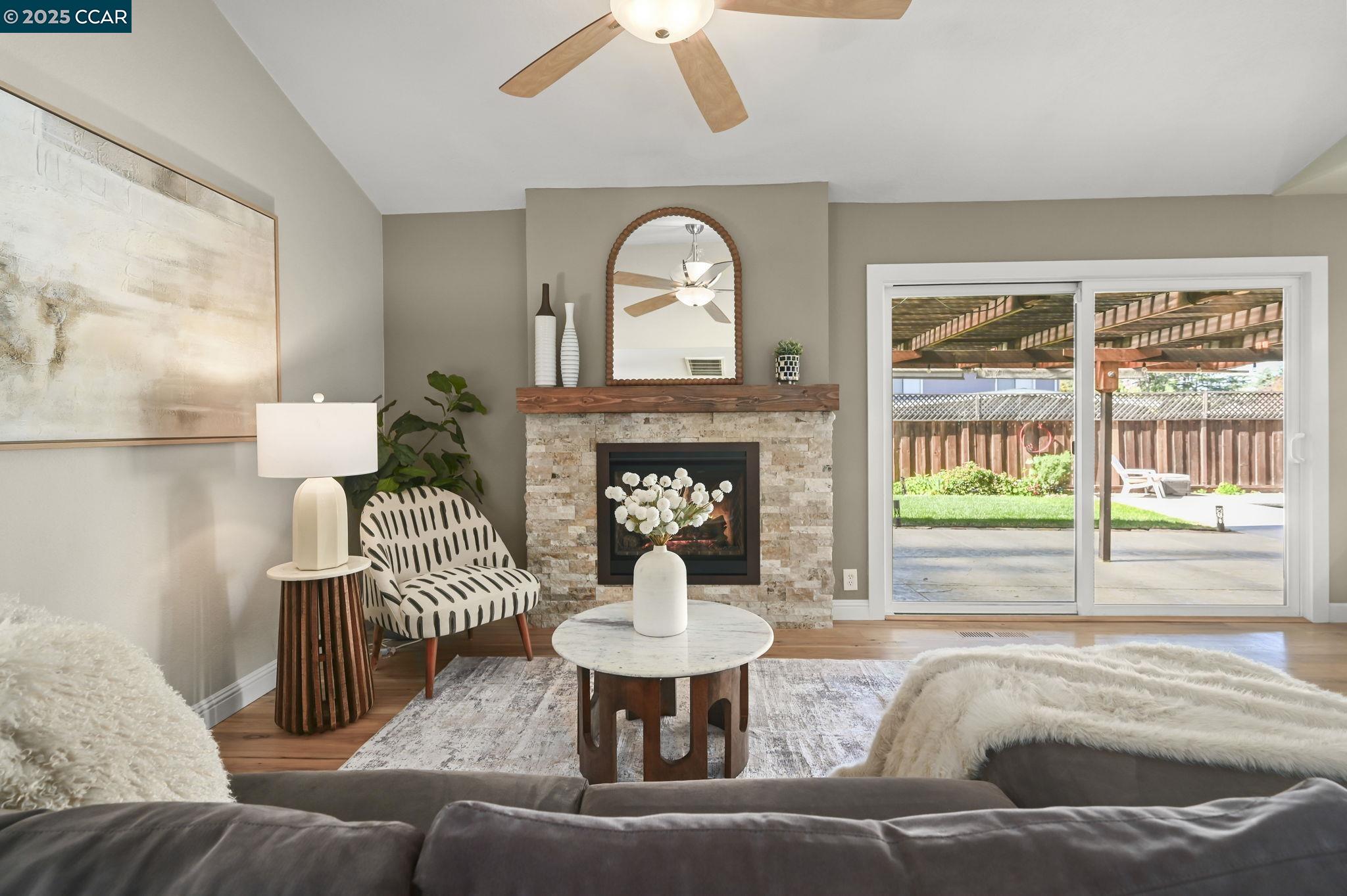 7 Atchinson Stage Road Clayton, CA 94517 - Photo 16 of 37 a living room with furniture and a large window