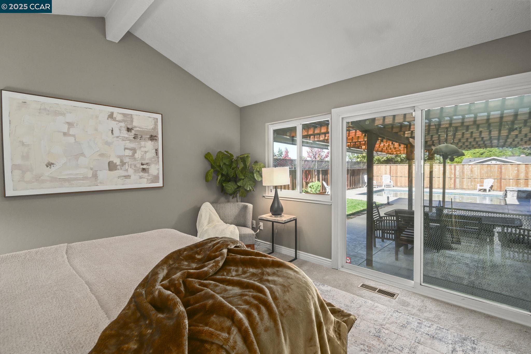 7 Atchinson Stage Road Clayton, CA 94517 - Photo 23 of 37 a bedroom with a large bed and a large window