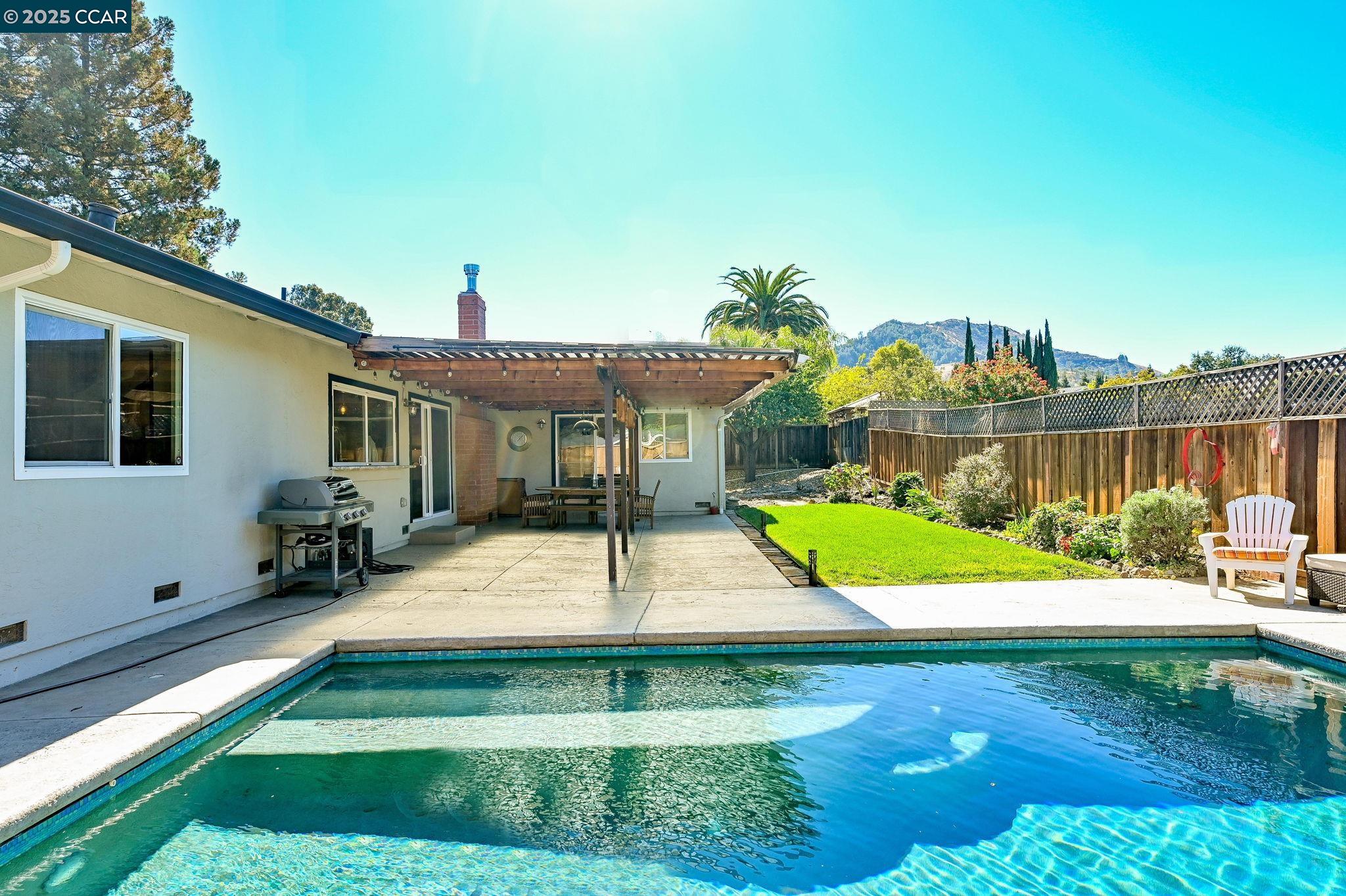 7 Atchinson Stage Road Clayton, CA 94517 - Photo 26 of 37 a house with garden in front of it