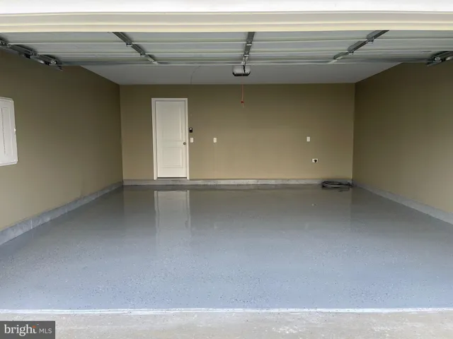 a view of a room with a wooden floor