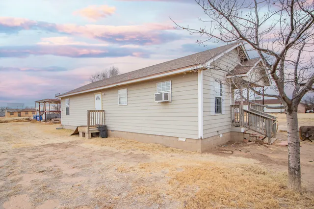 a view of a house with a patio