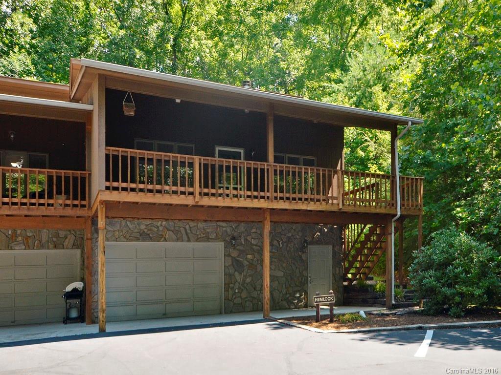 51 Forest Road, Unit 51 Canton, NC 28716 - Photo 1 of 14 a front view of a house with a yard