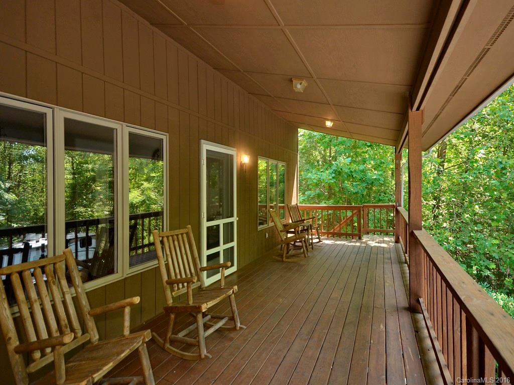 51 Forest Road, Unit 51 Canton, NC 28716 - Photo 12 of 14 a view of a chairs and table in the balcony