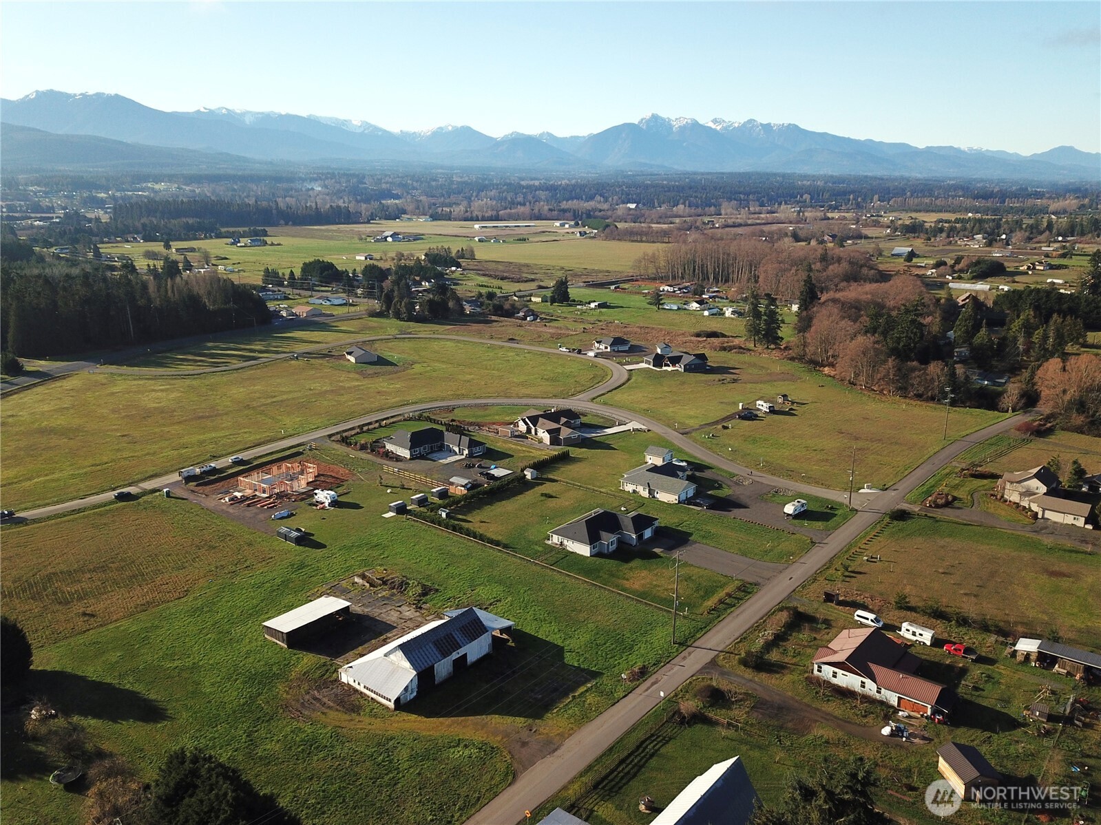 9999 Lange Lane Sequim, WA 98382 - Photo 14 of 16 an aerial view of residential houses with outdoor space
