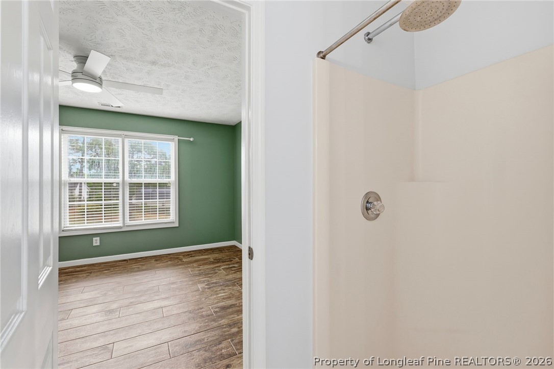 5113 Archer Road Hope Mills, NC 28348 - Photo 30 of 41 a view of an empty room with a window