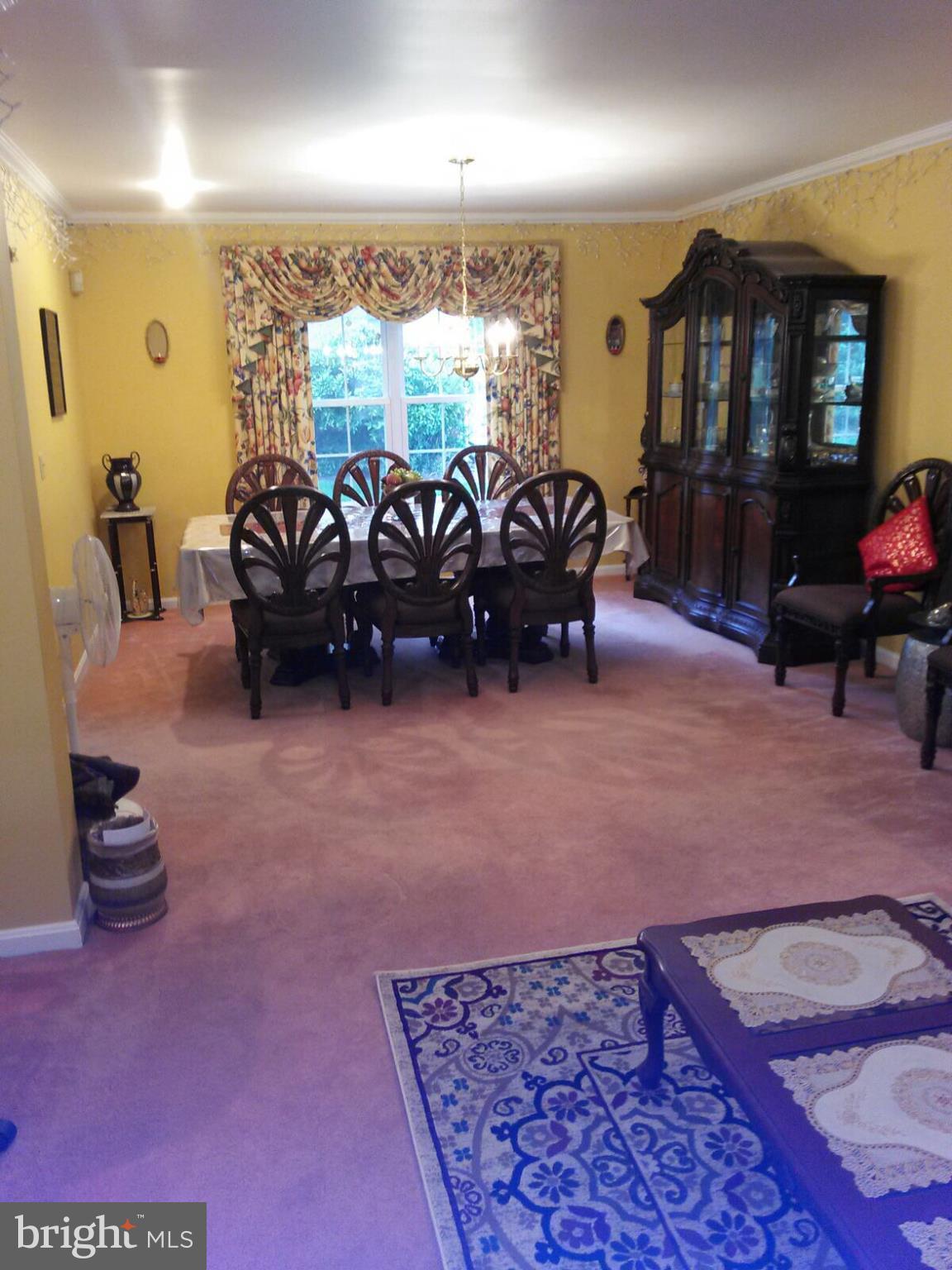 7006 Pinecrest Road Baltimore, MD 21228 - Photo 10 of 30 a living room with furniture and a flat screen tv