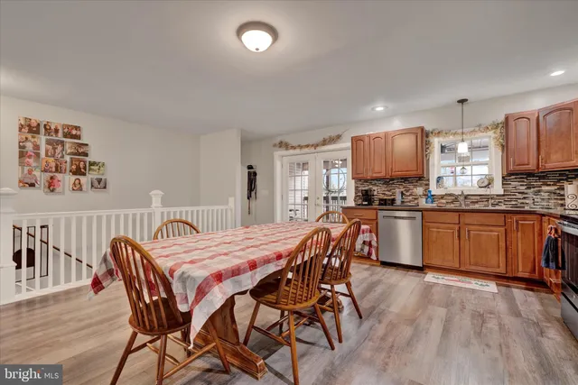 a bedroom with bed and a window