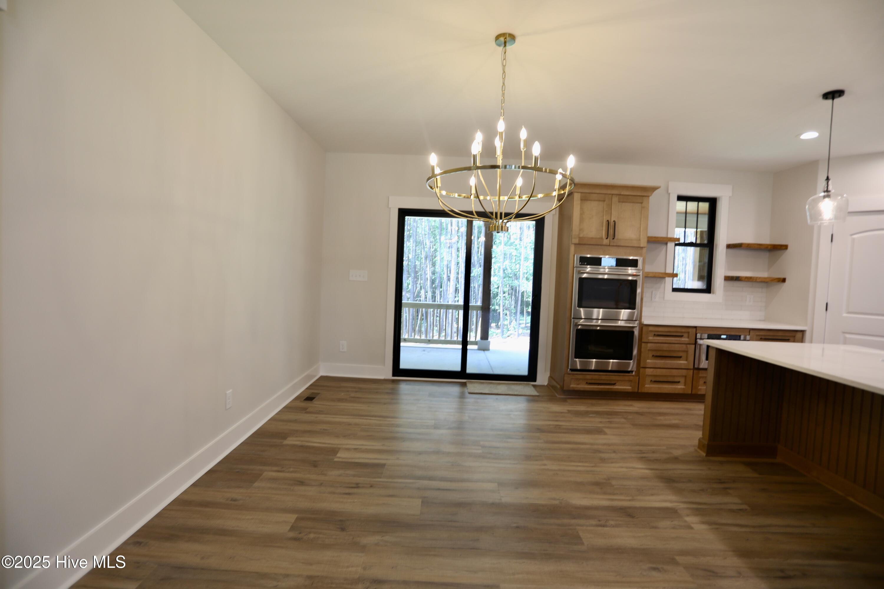 130 Gails Road West End, NC 27376 - Photo 16 of 61 Dining Room adjoins kitchen w/extra seating at bar