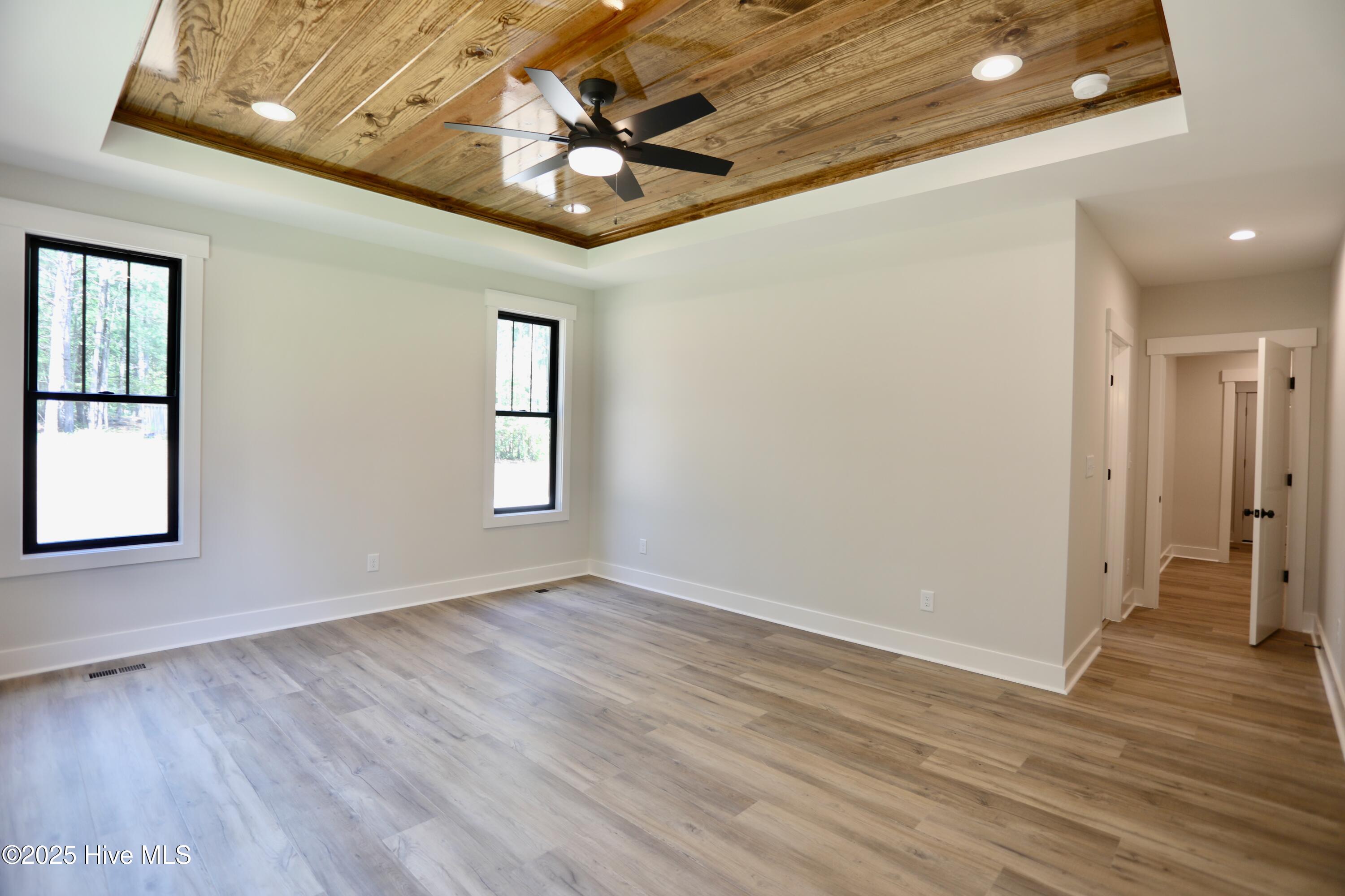 130 Gails Road West End, NC 27376 - Photo 25 of 61 Beauty in the details - wood trey ceiling & LVP flooring throughout