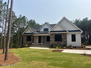 130 Gails Road West End, NC 27376 - Photo 2 of 61 Concrete drive, extra parking/turn-around & sidewalk to entrance