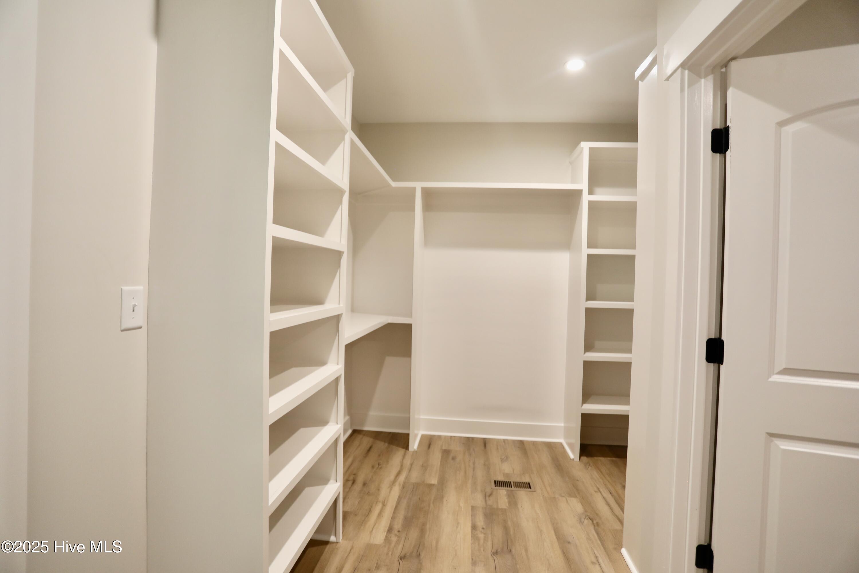 130 Gails Road West End, NC 27376 - Photo 31 of 61 Double sided custom closet wood shelving