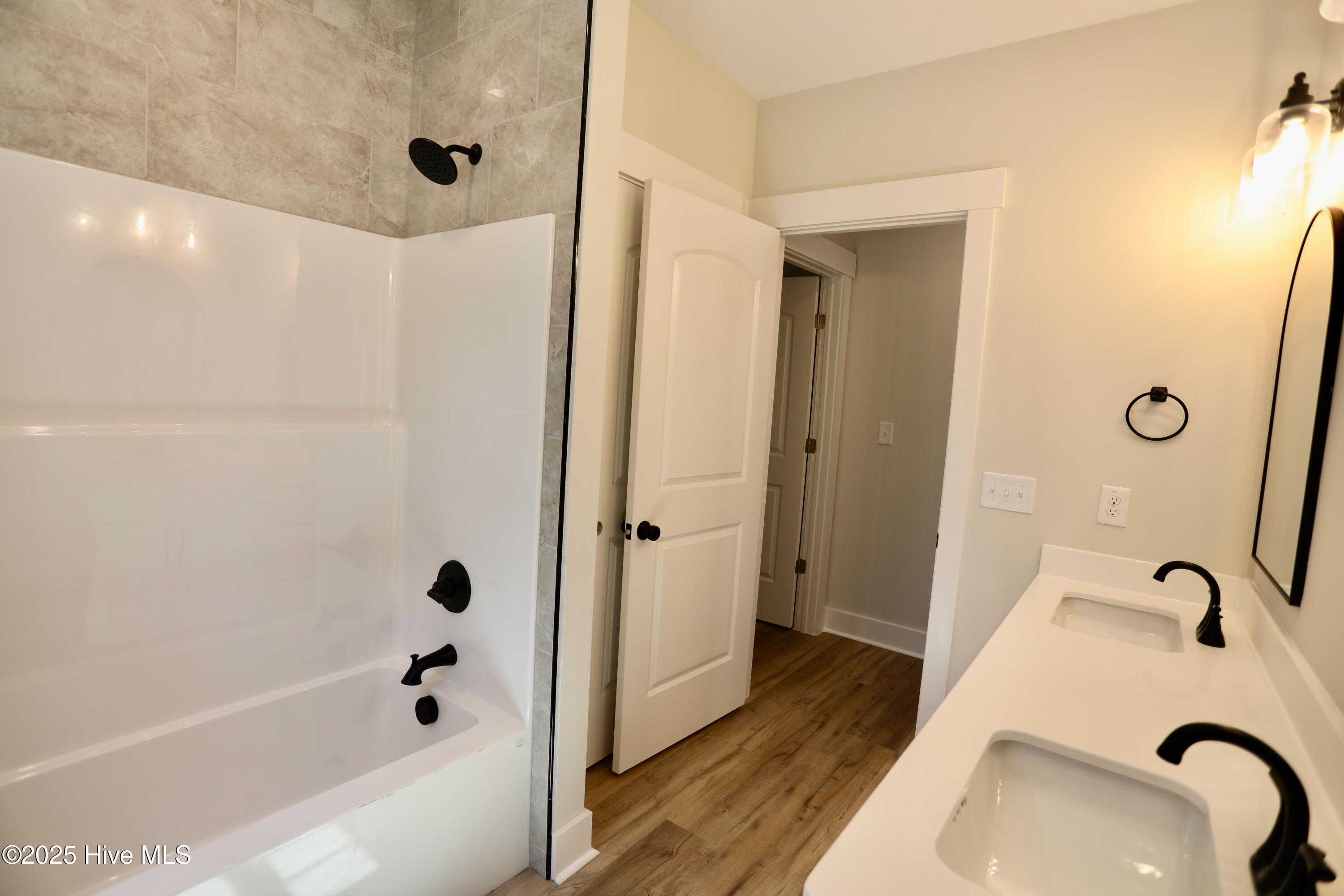 130 Gails Road West End, NC 27376 - Photo 37 of 61 Main level bath w/tub & shower + double sinks