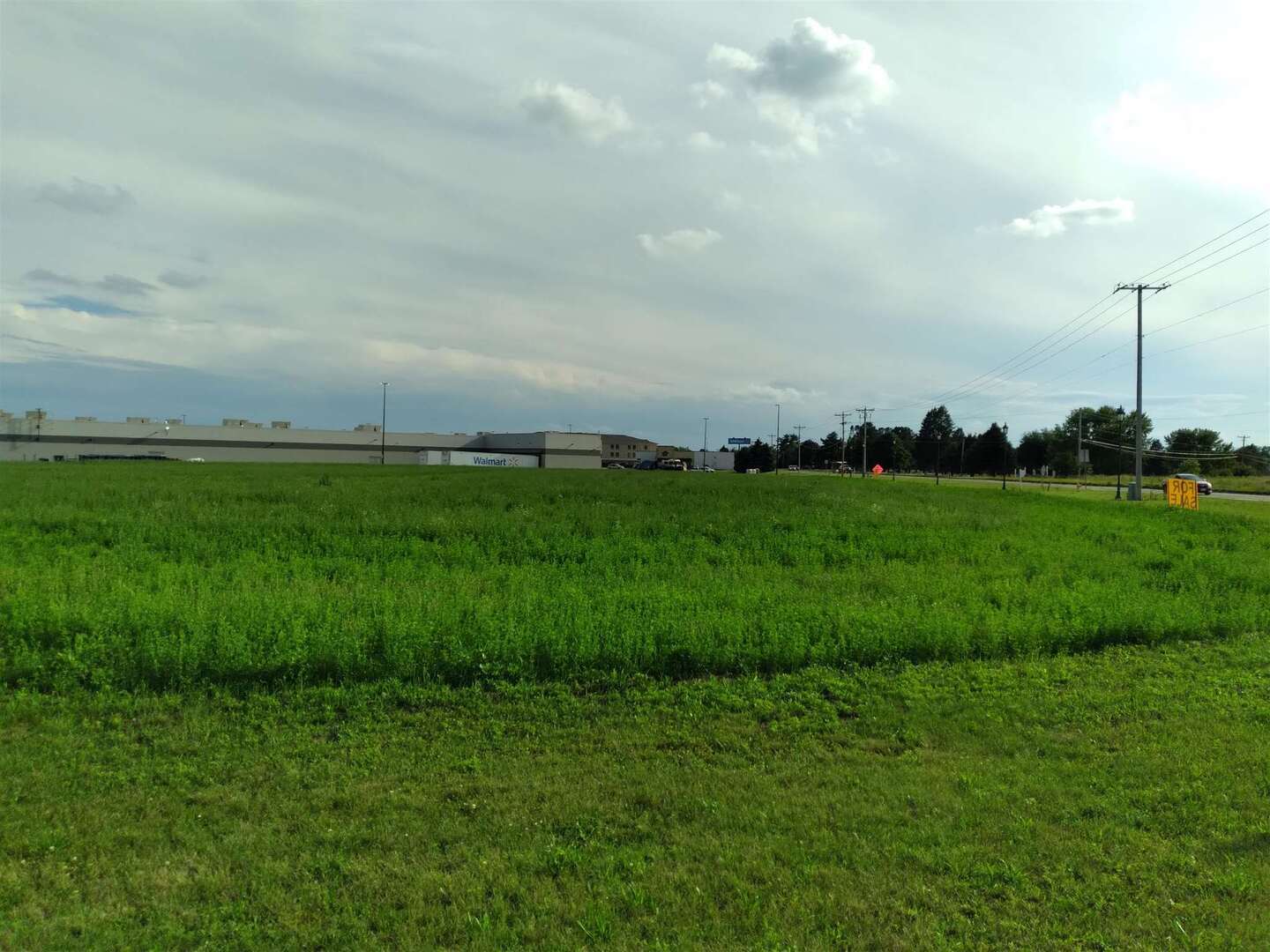2439 Valley W Court Clinton, IA 52732 - Photo 6 of 12 a view of a grassy field