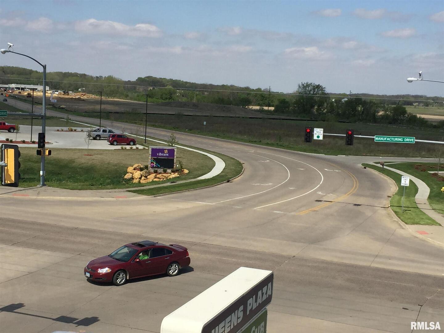 2439 Valley W Court Clinton, IA 52732 - Photo 9 of 12 a view of a swimming pool with a yard and mountain view