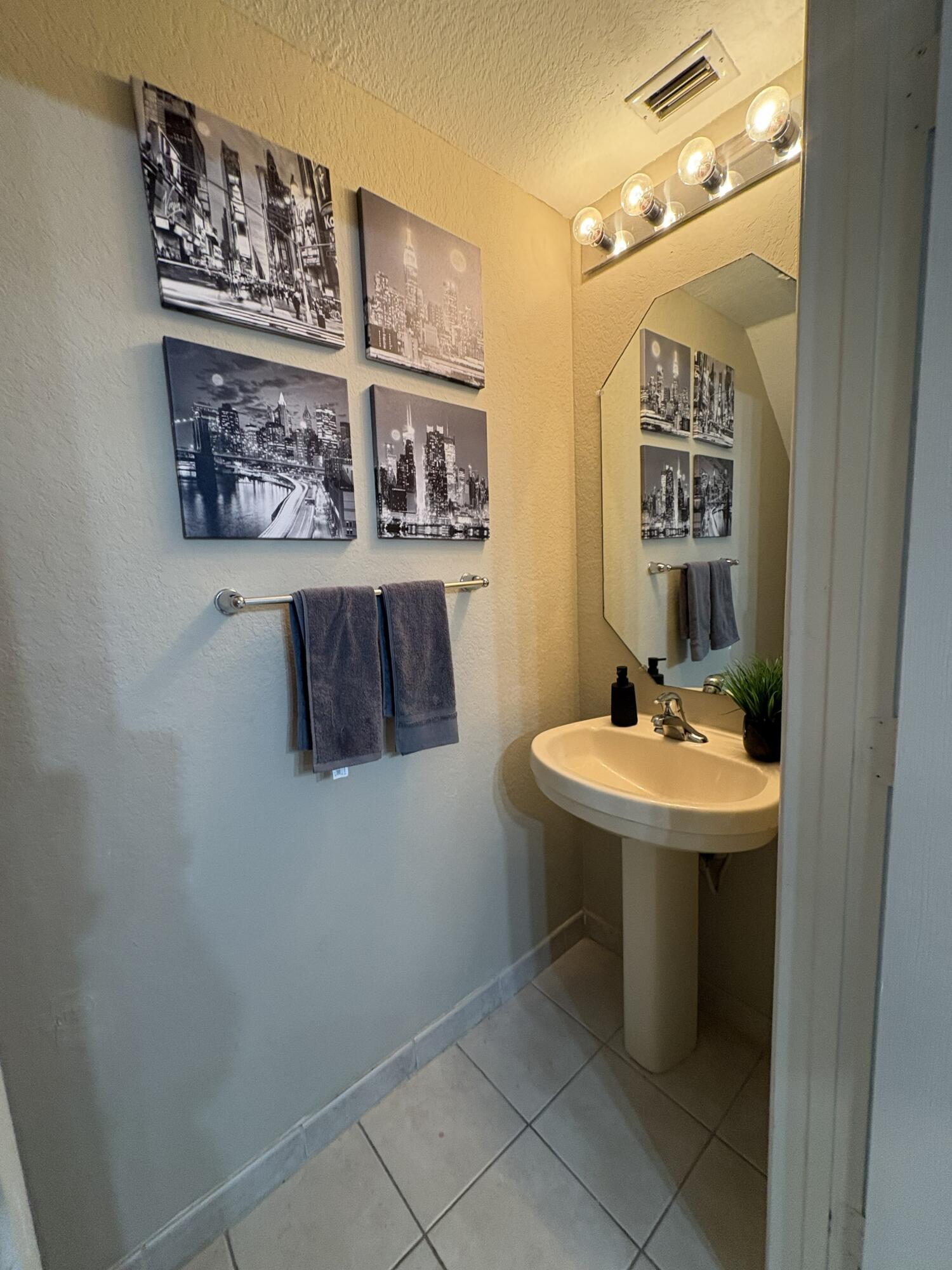 1966 Alamanda Way Riviera Beach, FL 33404 - Photo 7 of 25 Half Bath - Downstairs