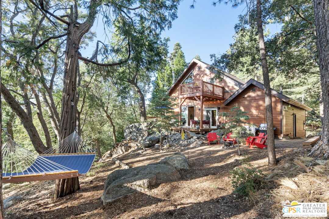 52352 Pine Ridge Road Idyllwild, CA 92549 - Photo 5 of 73 a front view of a house with a yard