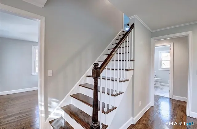 a view of entryway with wooden floor