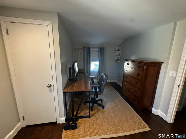 a view of a hallway with workspace