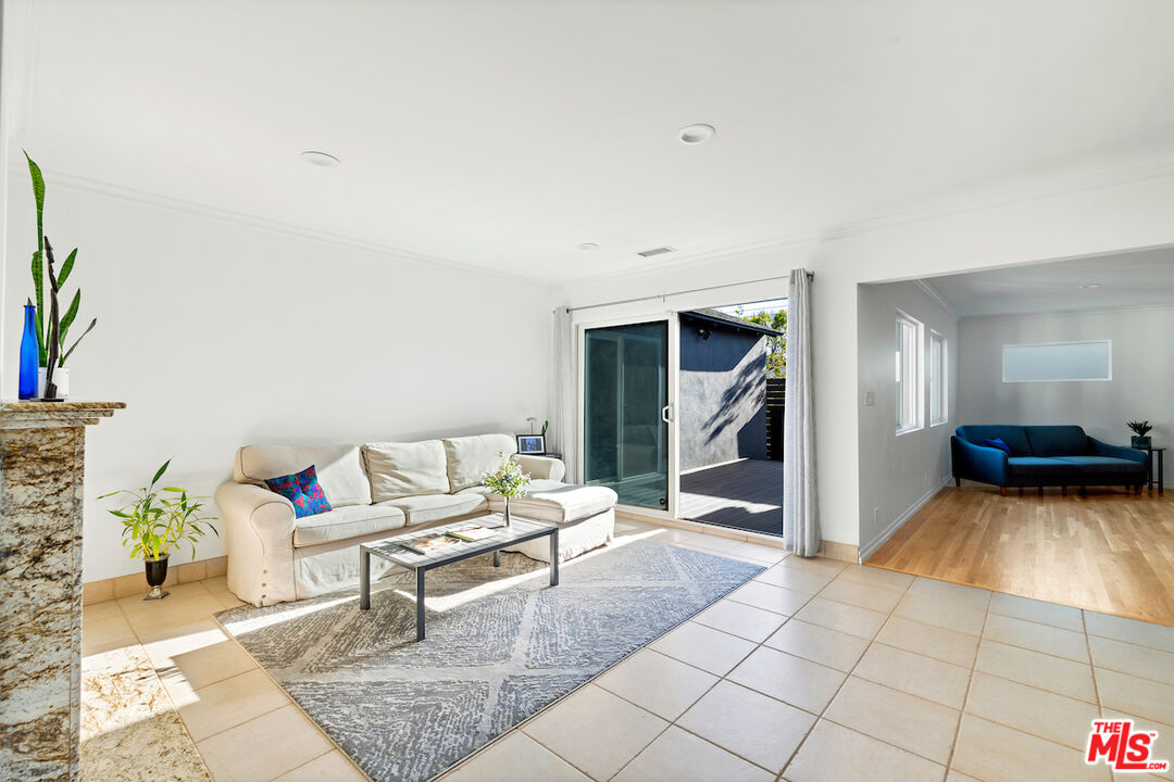 3381 Colbert Avenue Los Angeles, CA 90066 - Photo 4 of 24 a living room with furniture and a wooden floor
