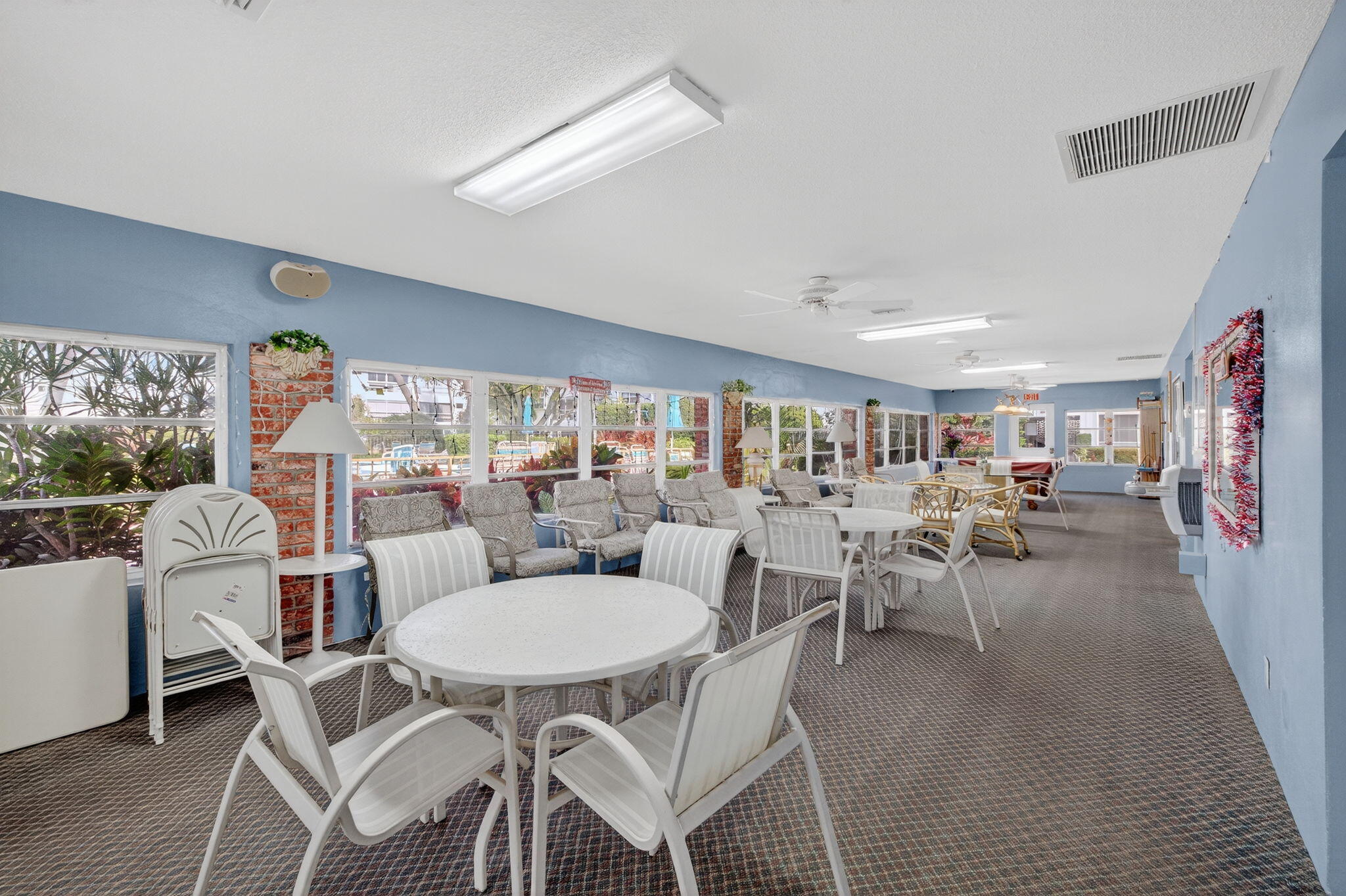2050 Northeast 39th Street, Unit S210 Lighthouse Point, FL 33064 - Photo 36 of 46 a view of a dining room with furniture