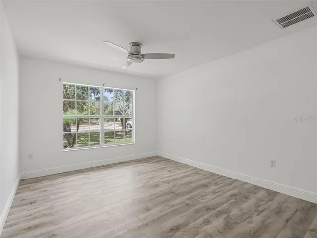 a view of swimming pool with a yard