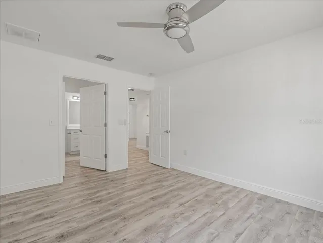 a view of a backyard with a garden and plants