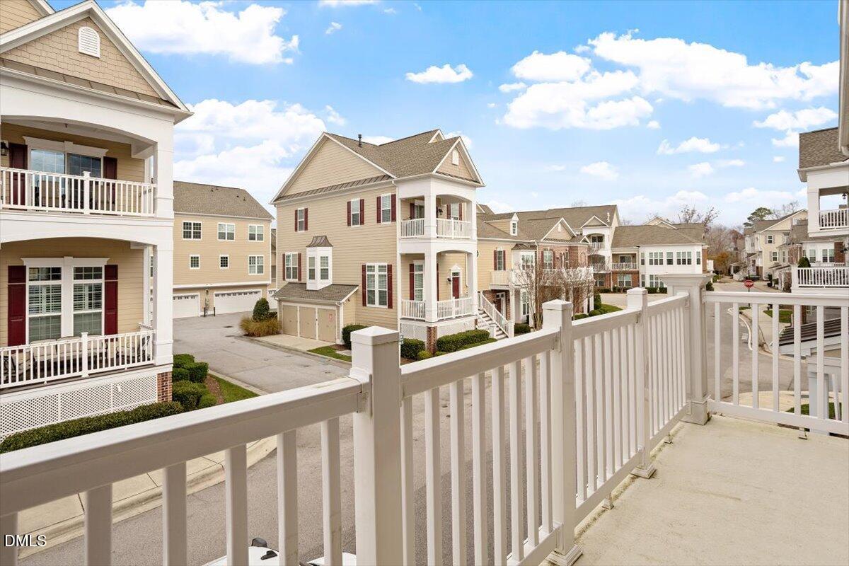 10530 Sablewood Drive, Unit 215 Raleigh, NC 27617 - Photo 24 of 40 a view of a building from a balcony