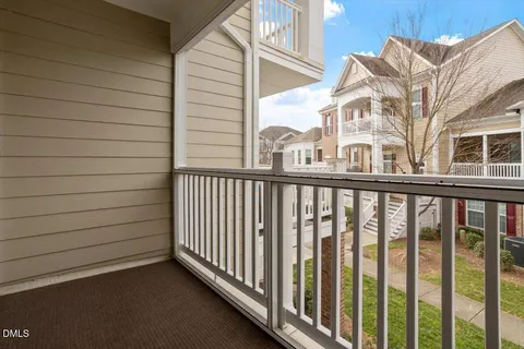 a view of a balcony with a pot