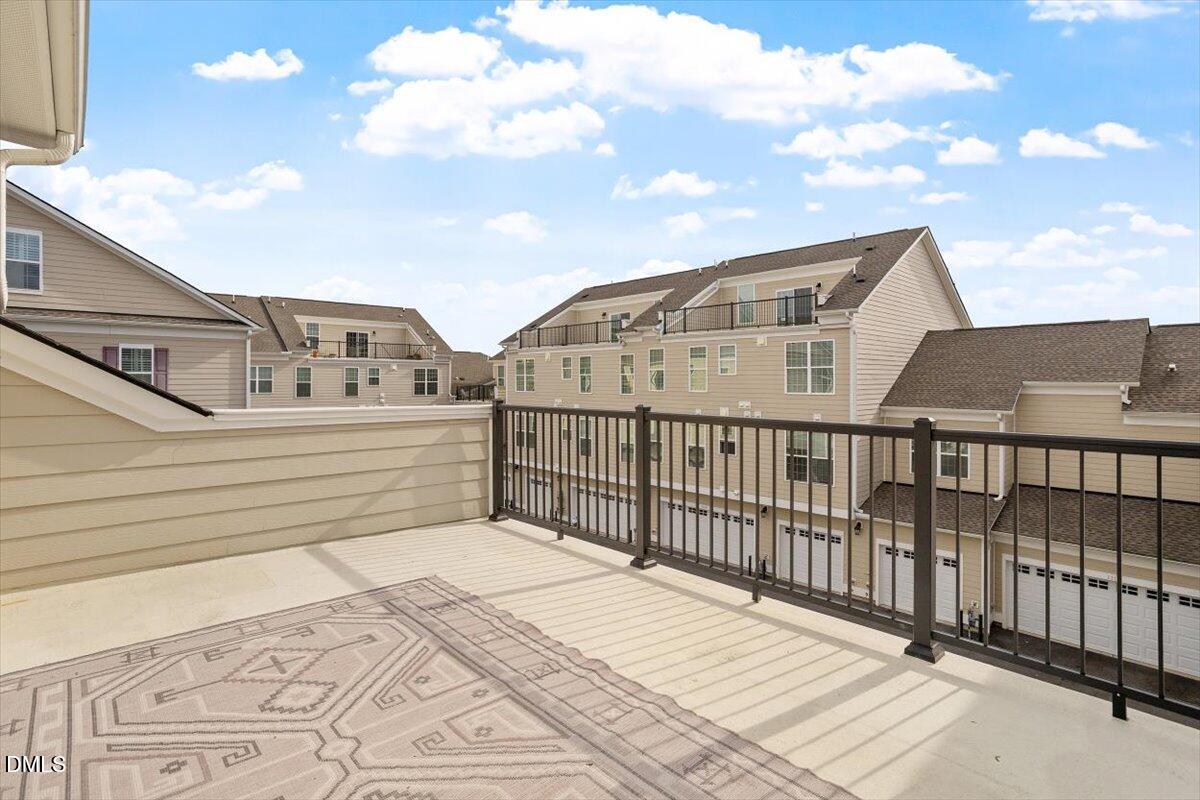 10530 Sablewood Drive, Unit 215 Raleigh, NC 27617 - Photo 39 of 40 a view of a house with wooden fence