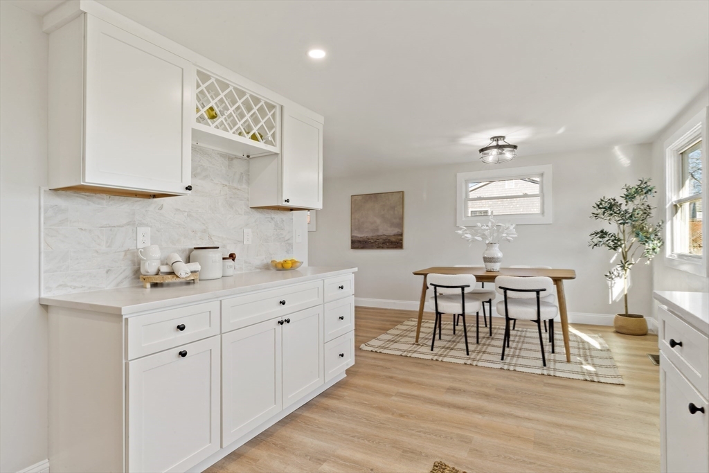 602 Regan Road Somerset, MA 02726 - Photo 14 of 35 a view of a kitchen with microwave and cabinets